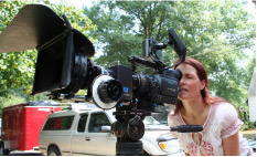 woman watching a camera