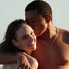 Young Couple On The Beach